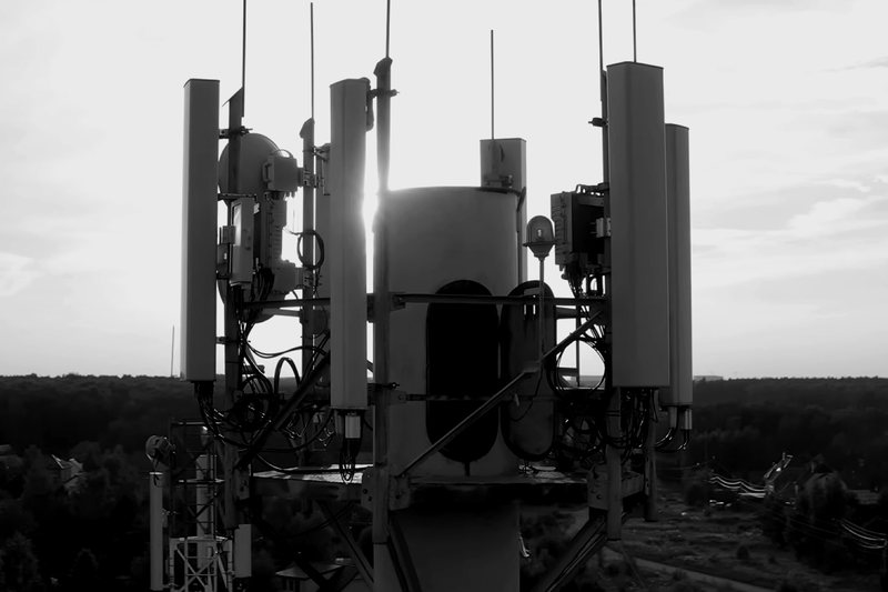 Telecom tower with antenna equipment fitted on additively manufactured PEEK mounting bases.